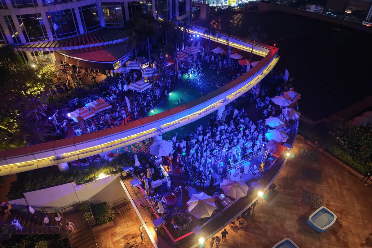 A Bangkok Rooftops pool party in full swing on the Centara Grand pool deck