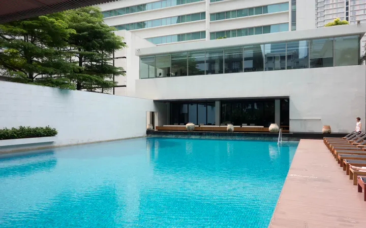 The outdoor pool at COMO Metropolitan Bangkok