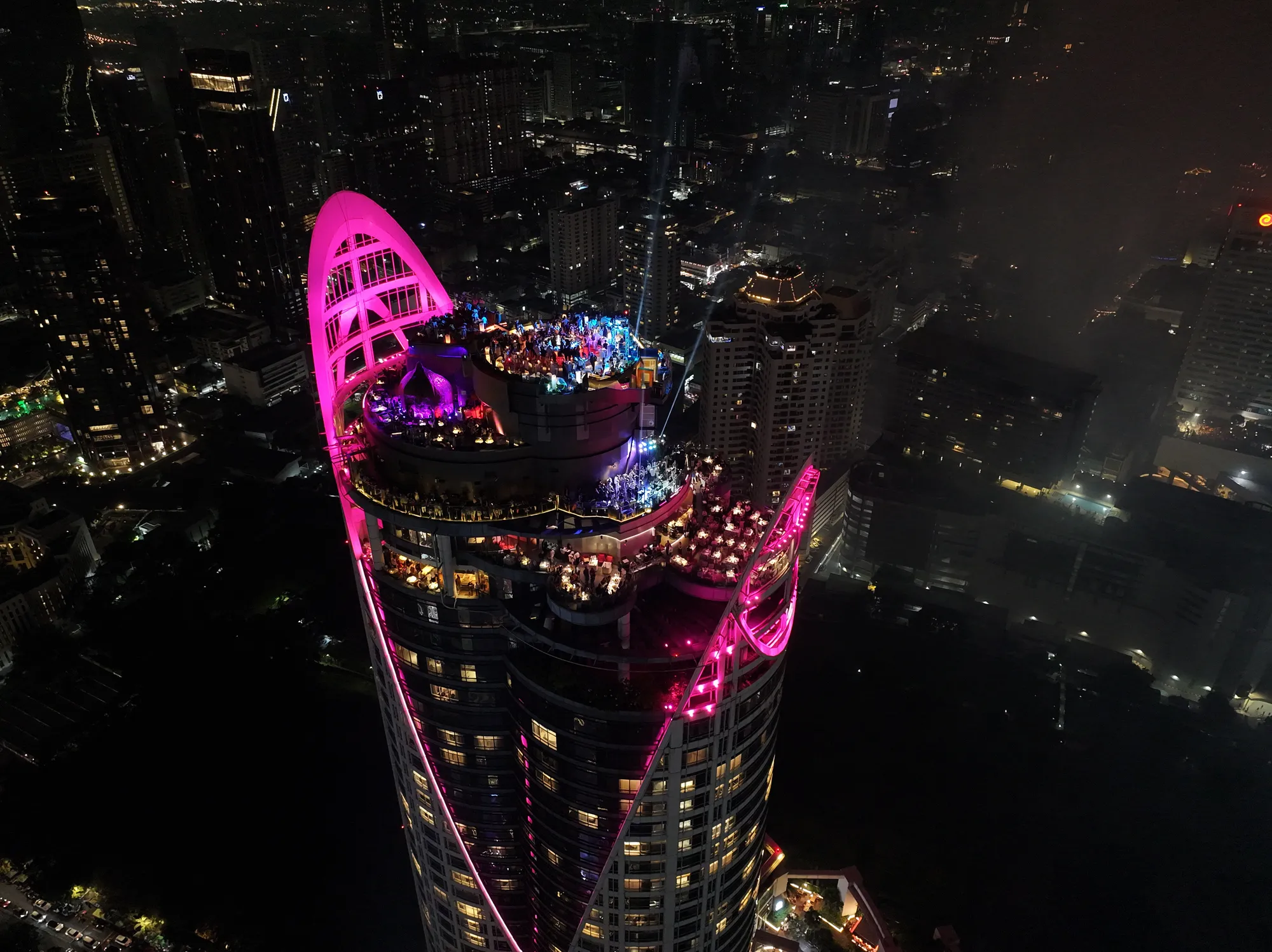 The Centara Grand tower lit pink just after midnight on 1 January 2026