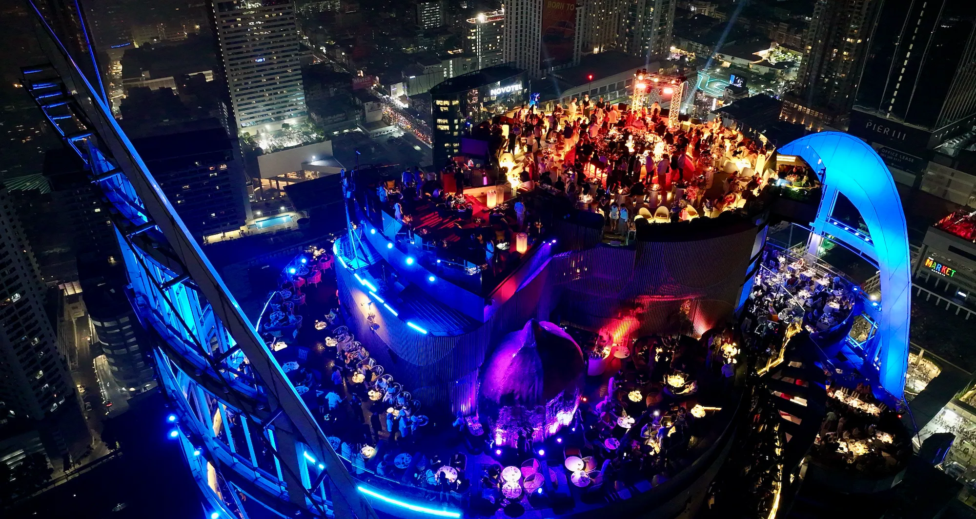 A rooftop party above the Bangkok skyline